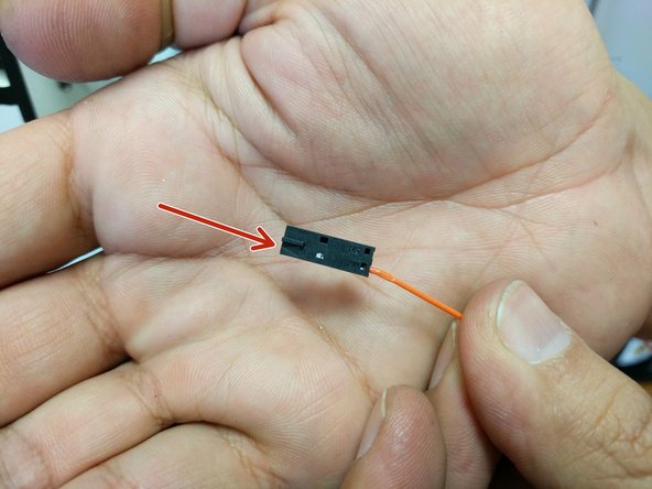 Insert the prepared wire and connector in the 2 pin latching connector in pin 1 (indicated with an arrow until you hear / feel a click. (just like with the end-stop wires)