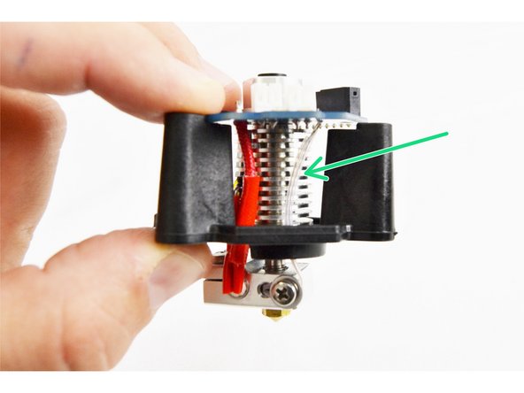 Notice that the side of the heat sink that contains the thermal safety fuse should be on the side of the PCB mount with the opening. (indicated with blue arrows)