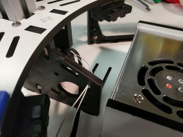 Route the wires as shown.