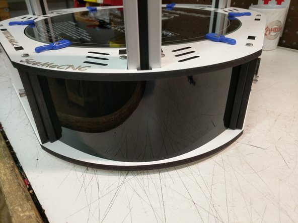 If you look at the injection molded base sides you will see the &quot;stop&quot; boss for the acrylic covers. Insert one side of the panel into the chosen corner, and then flex the panel into place.