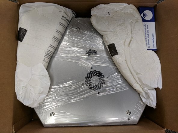 The other medium box is the upper assembly.