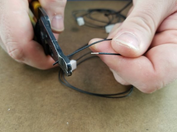Strip the bare ends of the black wires about 1/2&quot;.