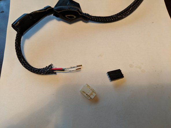 Repeat the previous step with the other thermistor wire to remove the black clip from the thermistor wires. as shown in Pic 1.