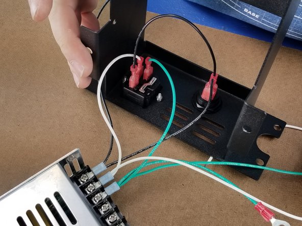Take the black wire from the rocker switch and attach the other end with the spade connector to the power plug as shown in Pic 2.