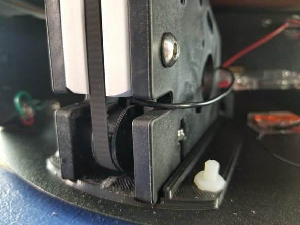 Ensure the belt is lined up and inside the idler as shown in Pic 3.