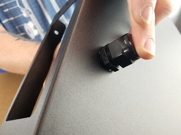 Once you insert the cable mount hub in the upper frame, secure into place with the nut from the inside as shown in Pic 2.