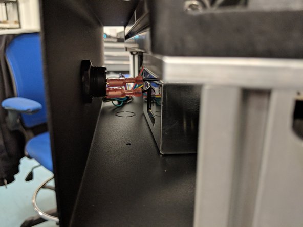 The power switch connector (black wire with spade crimp, exiting the Z tower wire bundle) connects to the free tab on the power switch as shown.