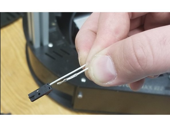 Using the 2 white wires for the thermistor, each end will have different connectors on them.  Looking at the first picture, insert the wires into the black 2 pin connector shown.