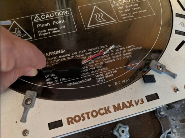 Slide the boot over all the wires and the loom as shown in Pic 2.  Slide it up enough so you have room to work on the plug wires.