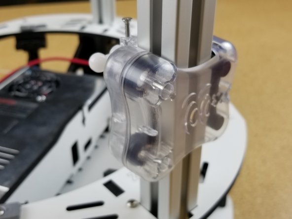 We will now install the injection molded carriages on the three towers. They will install on the towers with the ball joints facing the inside.