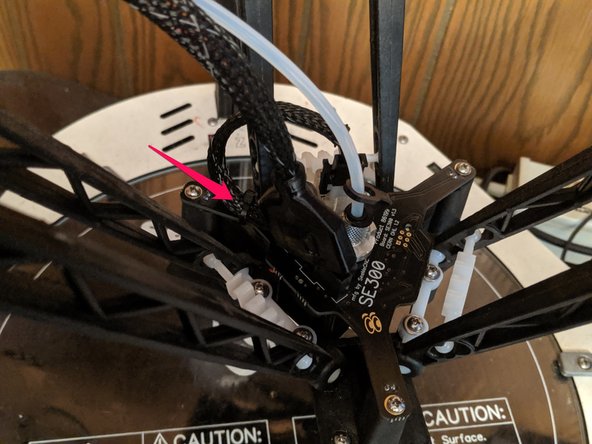 Place a zip tie on the wiring to secure the whip to the circuit board as shown by the arrow in Pic 3.