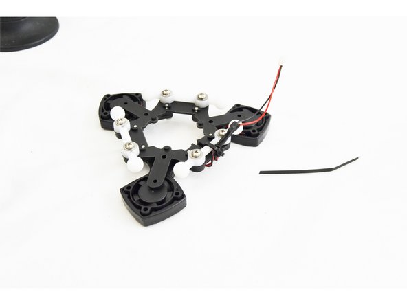 If you have received a REV6 accelerometer board, this step is NOT required. There is a connector for each fan on the board. After you get the hot end installed on the platform in step 56, you will find the best routing for the fan wires.
