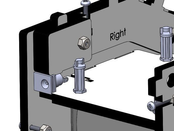 Push the Barrel Connector into the pocket show in the image. Once the Back Plate is installed this will fully constrain the connector.