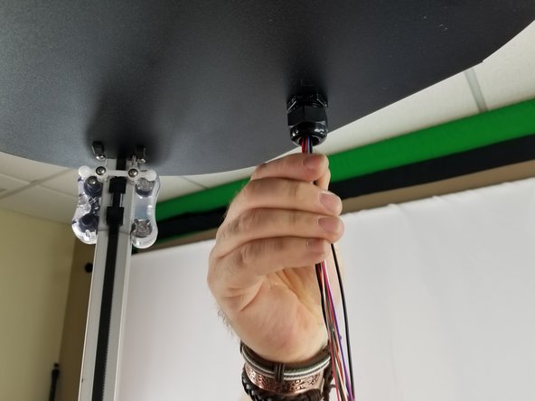 Insert the whip from the underside of the top into the large cable mount hub installed on the top as shown in Pics 1 and 2.