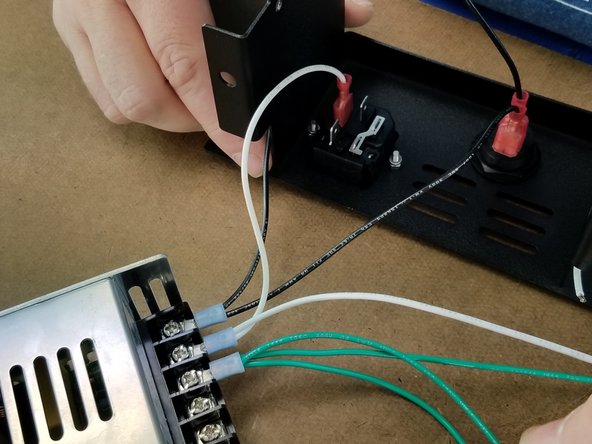 Take the white wire with spade connector from the power supply and attach it to the leg of the power plug as shown in Pic 1.