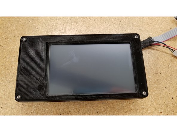 Secure the two enclosure halves together using the four #4 1/2" L sheet metal screws