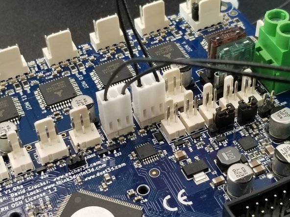 The Y motor is the one next to the Duet on the side where the white connectors are located.