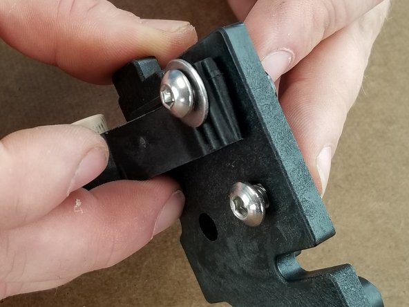 With the other bolt attach the bolt to the bracket with another T-Nut.  This is also not tightened yet, and left loose.