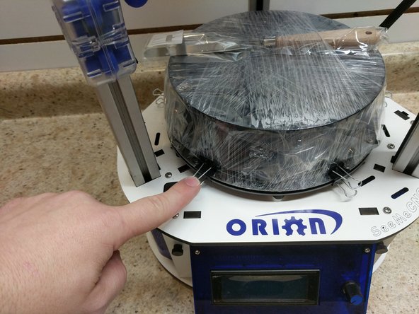 Remove the 6 bed clips holding the filament and glass plate in place.