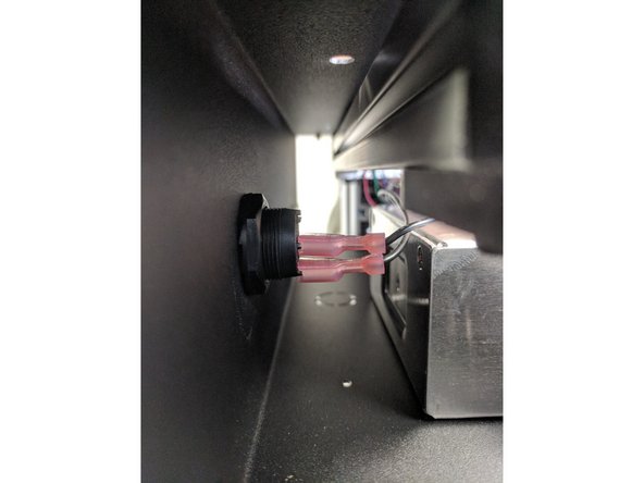 Install the spade connector (crimped on the remaining black 18awg wire) to the top of the rocker switch (front face of the printer).