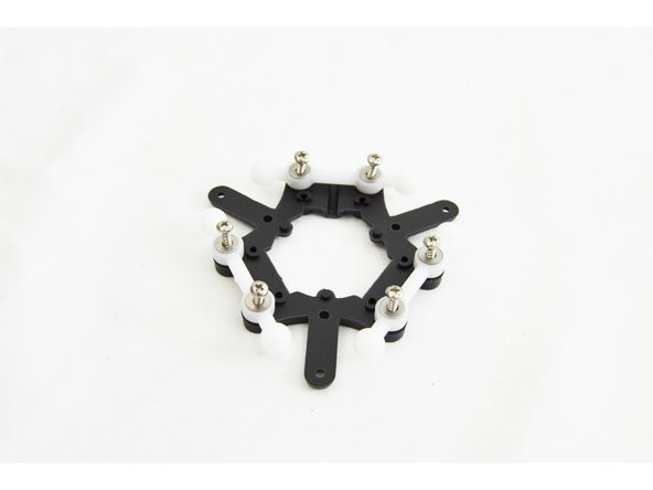 Install the joints onto each of the three sets of posts on the ball joint platform as shown.