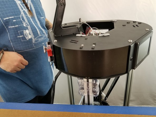 Carefully re-install your acrylic side panels.