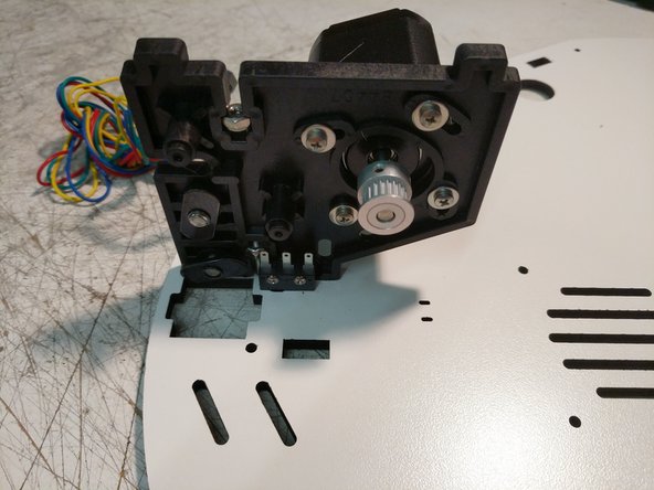 Install the (3) motor mounts on the Top Base Plate using (1) 6-32 x 1&quot; screw per motor mount. Do not fully tighten these screws.  Note the orientation of the Top Base Plate. There is laser engraved text on this plate noting which side should be DOWN)