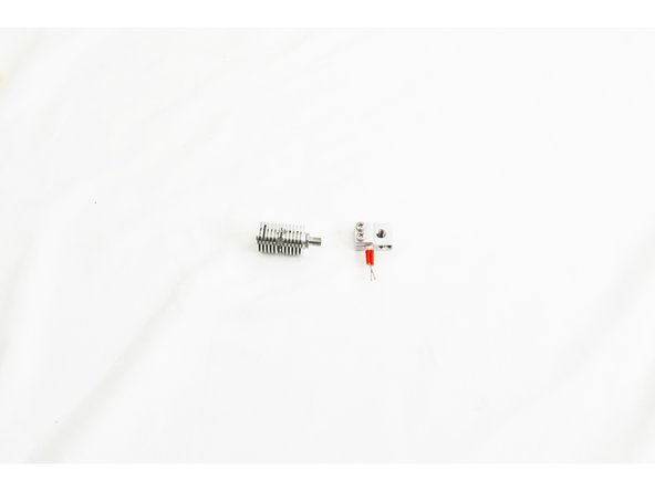 Screw the heat break into the heater block approximately 4mm.