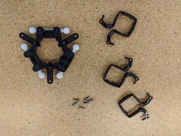 Fix each fan bracket in place using two #4, 3/8&quot; screws for each one.  DO NOT TIGHTEN .  The screws will be tightened down in a later step.