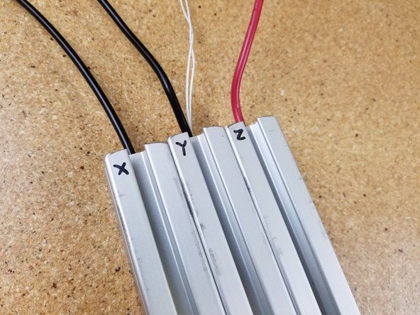 Locate the (3) pieces of T-Slot, (2) white 26awg thermistor wires, and long (3) 12awg red/black wires.
