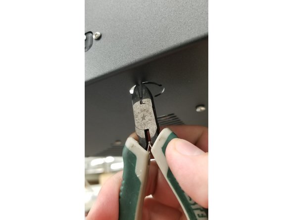 Be VERY careful, as the sheet metal can be very sharp on the areas where the tabs were after you've snipped them off. It's recommended to carefully file down the tabs to smooth them out and avoid getting cut.