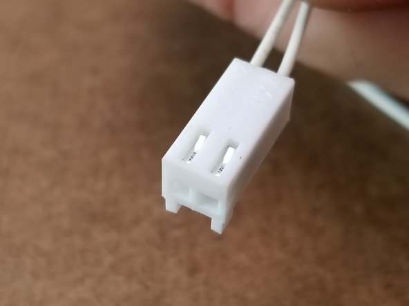 The back of the crimped connector will face the side of the housing with the windows in it as shown in Pic 2.