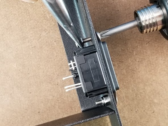 The plug receiver will use both screws and both lock nuts to secure it in place.