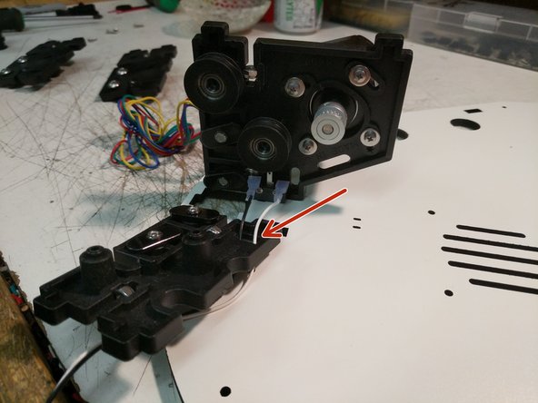 After installing the wires, bend the end stop over as shown.