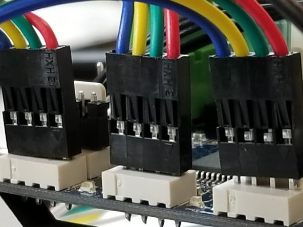 Make sure the motor connectors are facing the proper direction, with the red wire facing the front of the machine.