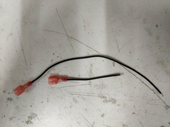 Remove the insulation from the ends of the 18awg black wires.
