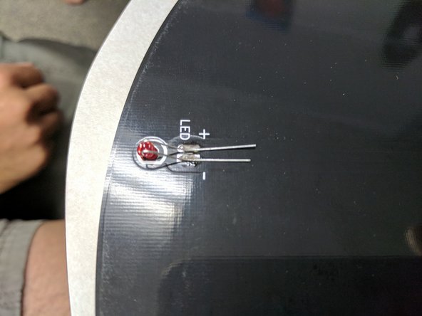 Solder the LED to the heated bed. NOTE the polarity of the LED in the picture. The short leg is the - and the long is the +