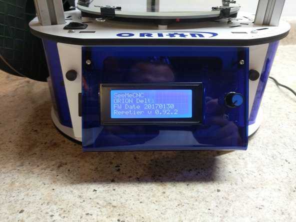 You should see an initial splash screen that shows the printer model and firmware version and compilation date.