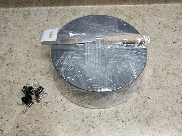 Remove the filament and glass plate from the print area.