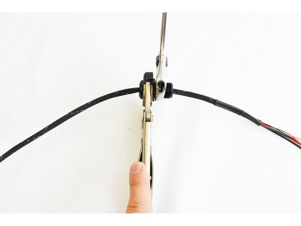 Align the Cable Mount Hub (26220) with the mark. (The reference is the opposite of the threads on the cable mount hub, as shown in the pic)