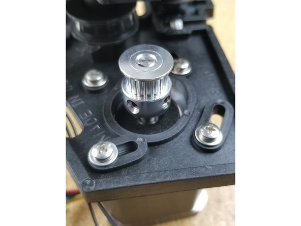 We will now build up the upper assembly. You will need the motor mount assemblies you previously built and the upper assembly base plate.