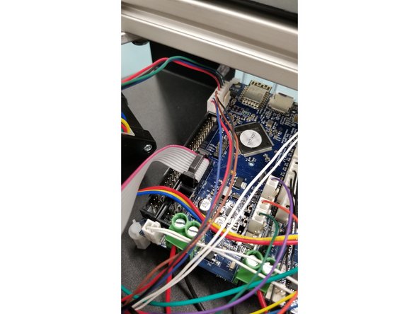Plug the cables into the Duet board as shown, and replace the top cover on your printer.