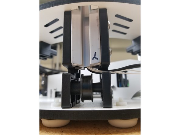 You will now install the remaining two towers just as you did the Z tower. Begin with the Y tower, which has the white thermistor wires run through the center hole.