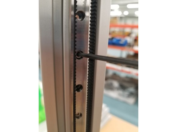 Remove the linear rail bolts from the top of the tower down to the last bolt before the hole where the extruder and whip wires enter the tower.
