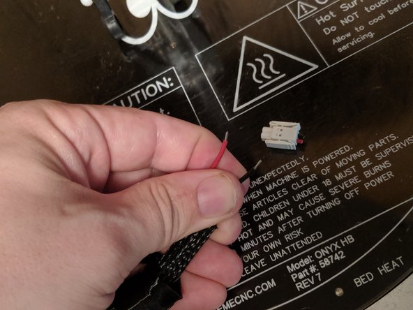 Strip off a few millimeters of the covering of the wire as shown in Pic 3.