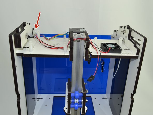 Tuck the wires on the side that the Mini-RAMBo will go next to the post as indicated. This will keep the wires out of the way of the board support while inserting the board.