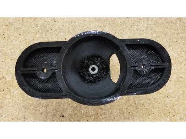 Make sure the 10-32 nylon lock nut is seated in the arm post as shown.