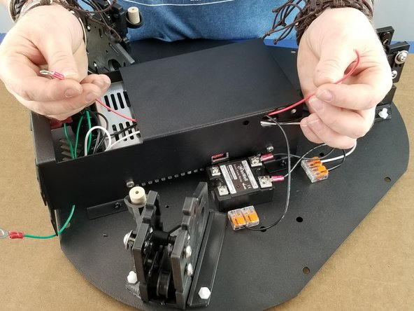 Repeat the same process as the previous step with the 400mm red wire that has one ring terminal and bare wire on the other end.