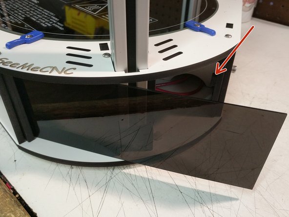 Remove the paper backing from both sides of the acrylic panels.