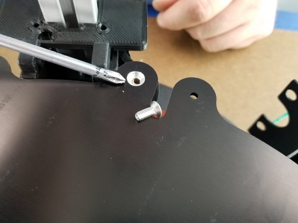 This step you will need the 3x M4 x 10mm long flat head screws from the lower hardware pack to attach the bed to the PEEK insulators.